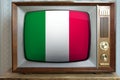 Old tube vintage TV with the national flag of italy on the screen, stylish 60s interior, the concept of eternal values Ã¢â¬â¹Ã¢â¬â¹on